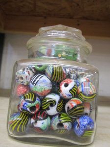 lot 128 image: GLASS JAR FILLED WITH COLORFUL PAINTED GLASS BEADS