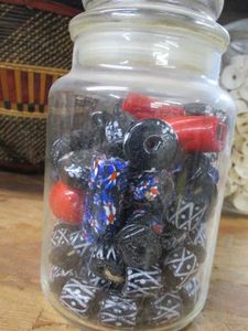 lot 138 image: GLASS JAR FILLED WITH BEADS