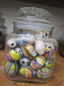 lot 155 image: GLASS JAR FILLED WITH PAINTED GLASS BEADS