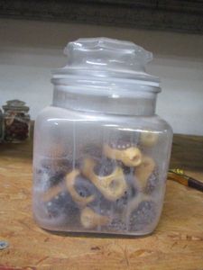 lot 158 image: GLASS JAR FILLED WITH BEADS