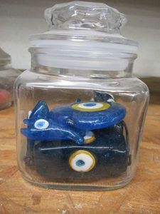 lot 170 image: GLASS JAR FILLED WITH CHUNKY GLASS BEADS.&nbsp