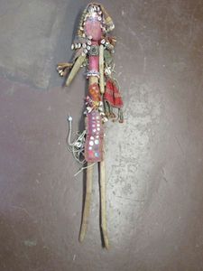lot 269 image: HAND MADE DOLL FROM INDIA MADE WITH WOOD PIECES, SHELLS, AND OTHER MISC ITEMS.&nbsp