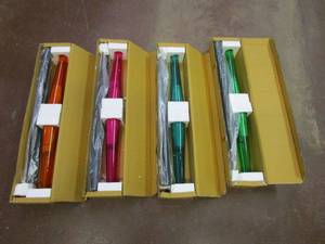 lot 352 image: SET OF 4 GARDEN CANDLE TORCHES NEW IN BOX. .DARK BLUE ONE NOT INCLUDED, ONLY USED TO SHOW ASSEMBLED PIECE.&nbsp