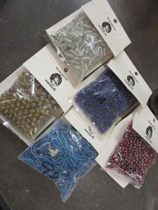 lot 235 image: LOT OF GLASS BEADS NEW IN PACKAGE, MAHARANI LABELED, HAND MADE IN INDIA