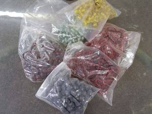 lot 287 image: MIXED LOT OF GLASS BEADS IN PACKAGING, HAND MADE IN INDIA