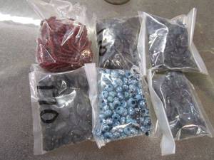 lot 288 image: MIXED LOT OF GLASS BEADS IN PACKAGING, HAND MADE IN INDIA