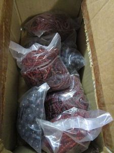 lot 294 image: MIXED LOT OF GLASS BEADS IN PACKAGING, HAND MADE IN INDIA