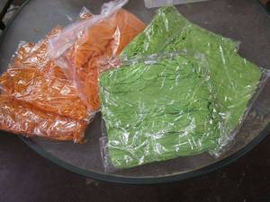 lot 302 image: LOT OF GREEN AND ORANGE BOHO STYLE SCARVES NEW IN PACKAGING