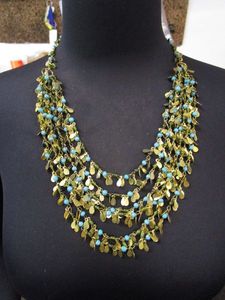 lot 305 image: TURQUOISE AND GOLD COLOR FASHION NECKLACE HAND MADE WITH MATERIALS IMPORTED FROM INDIA. MANEQUIN NOT INCLUDED.&nbsp