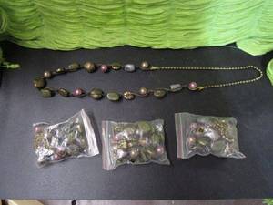 lot 313 image: HAND BEADED NECKLACE ES WITH PINK, GOLD COLOR, AND GREEN BEADS FROM INDIA. SOME NEW IN PACKAGING.&nbsp