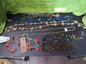 lot 314 image: NECKLACES LOT WITH 2 HEART BRACELETS
