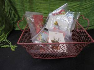 lot 365 image: PINK WIRE BASKET WITH HEART HANDLES, LOT OF NEW EARRINGS IN PACKAGING.