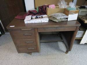 lot 425 image: WOOD DESK. BACK LEG MIGHT BE BENT. CONTENTS NOT INCLUDED.&nbsp