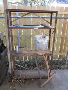 lot 34 image: ANTIQUE BOW SAW, METAL SHELVING, HYDROLIC BOTTLE JACK, STEEL BRUSH, SMALL SHOVEL