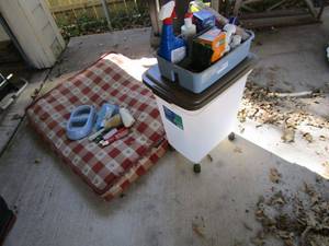 lot 40 image: PET LOT W LARGE PET BED, ROLLING CONTAINER, BRUSHES, PET CARE PRODUCTS