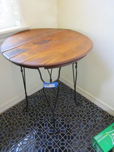 lot 79 image: VINTAGE ROUND WOODEN TABLE ON 3 HAIRPIN LEGS, SLIGHT BOW IN WOOD