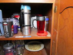lot 63 image: CONTENTS ON BOTH SHELVES OF BOTTOM KITCHEN CABINET