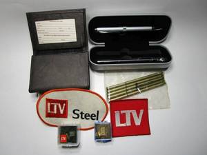 lot 92 image: LTV PINS AND CUFFLINK, LOCKHEED MARTIN PACK OF PENS,SILVER PEN &ampTIRE PRESSURE GAUGE IN CASE, NEW WALLET