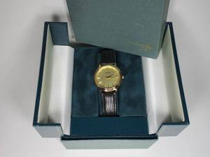 lot 95 image: LOCKHEED MARTIN JOSTENS GIFT WATCH IN CASE, LEATHER BAND