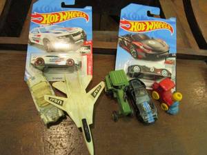 lot 198 image: TOY VEHICLES-2 HOTWHEELS UNOPENED, VINTAGE BOSS HOGS CADILLAC, VINTAGE TRACTOR, USAF JET, WIND UP TRAIN