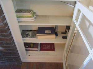 lot 231 image: ALL CONTENTS IN CABINET RIGHT OF FIREPLACE