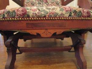 lot 153 image: ANTIQUE STUDDED GLIDER WITH FLORAL PATTERN UPHOLSTRY