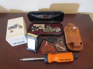 lot 246 image: ALL HARLEY DAVIDSON- SCREWDRIVER, LEATHER CASE, 3 KEYCHAINS, ZIPPO KEEPSAKE 2008 FXCWC SOFTAIL ROCKER C, KNIFE W HARLEY SHAPED HANDL &amp, HD OF BEAUMONT POKER CHIP IN HD CASE