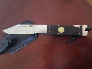 lot 261 image: A.G. RUSSELLS 2014 TEXAS RANGER- KING OF THE WOODS KNIFE, 1,000 PIECE LIMITED EDITION WITH NICKLE SILVER TEXAS RANGER STAR INLAY ON HANDLE