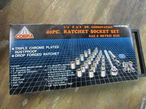 lot 336 image: COBRA 40PC RATCHET SET, SAE &amp METRIC, BAND SAW BLADES, JIG SAW BLADES, STRAIGHT LINE LASER LEVEL