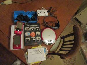lot 227 image: 2 CELL PHONES, CORDED CASSETTE TAPE, CD WALKMAN, HEADPHONES AND MISC CORDS