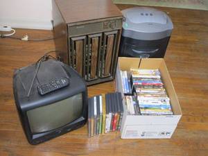 lot 228 image: TUBE TV, VINTAGE DEHUMIDIFIER, PAPER SHREDDER, DVDs, VHS &amp CORDS