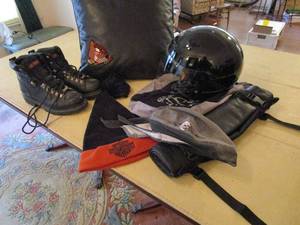 lot 384 image: ALL HARLEY DAVIDSON-HELMET, BOOTS, TRAVEL PACK, 2 HATS, LEATHER PILLOW