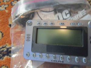 lot 147 image: ALARM CLOCK, PHONES, REMOTES, PORTABLE CD RADIO