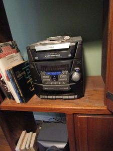 lot 430 image: RCA 5 DISC CHANGER STEREO #RS2604- AM FM RADIO, CDs, CASSETTES. CAPABLE OF RECORDING TO CASSETTES, 2 SPEAKERS, BASS BOOST