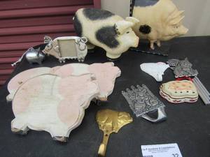 lot 32 image: Pigs, Pigs, Pigs- 4x6 photo frame, door hanger, wind chime, gold coat hanger, and 2 wooden cuties