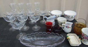 lot 35 image: Wine glasses, glass platter, creamer,  dishes