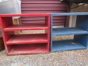 lot 42 image: 2 open back bookshelves. One red and one blue