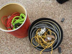 lot 43 image: 2 buckets -  extension cords, water hose, drop light