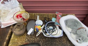 lot 71 image: travel iron, oil lamp,  candle stand, lamp with no top
