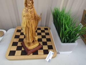 lot 99 image: 12 wooden Jesus,  wooden checkerboard,  Faux plant in planter
