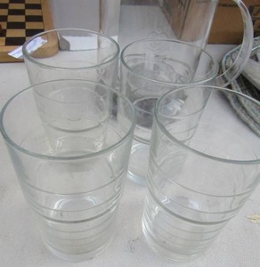 lot 100 image: Water pitcher  with assorted water glasses