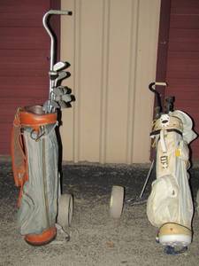 lot 10 image: 2 rolling golf  bags and clubs