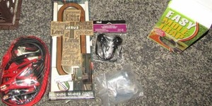 lot 22 image: Jumper cables,  dcor,  crosses & more