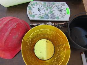 lot 128 image: Flower dcor clock temp gauge, black plastic candy bucket, hard hat, 11 poinsettia centerpiece DISH