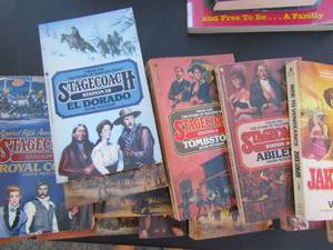 lot 135 image: 23 books by Hank Mitchum- Stage Coach, Death valley, Cimarron and more.