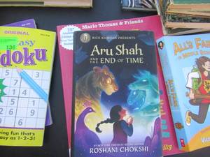 lot 136 image: Crosswords and adventure books- Alls Faire in middle school, Aru Shan and the end of time and more