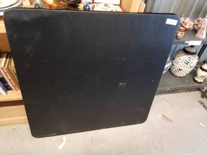 lot 24 image: Black fold up card table with one chair