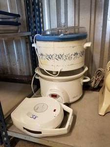 lot 38 image: Oester waffe maker and 2 crock pots