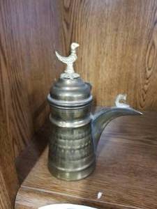 lot 77 image: Turkish brass handled hand hammered coffee pot