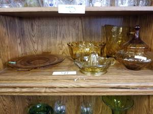lot 91 image: Selection of amber glass dishware